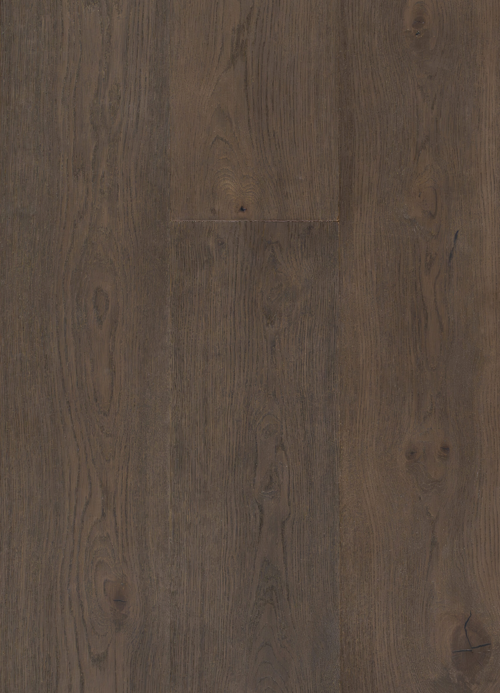 Espresso engineered white oak wood flooring in a deep smoked brown tone with charcoal undertones and visible wire-brushed grain
